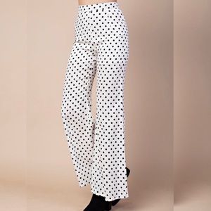 White and black polka dot flare pants
